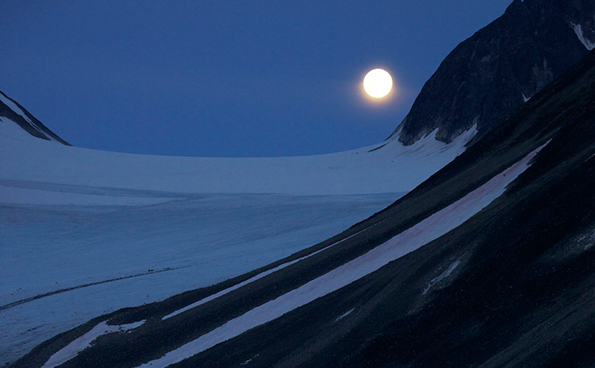 The moon rises over the Arctic during the polar night